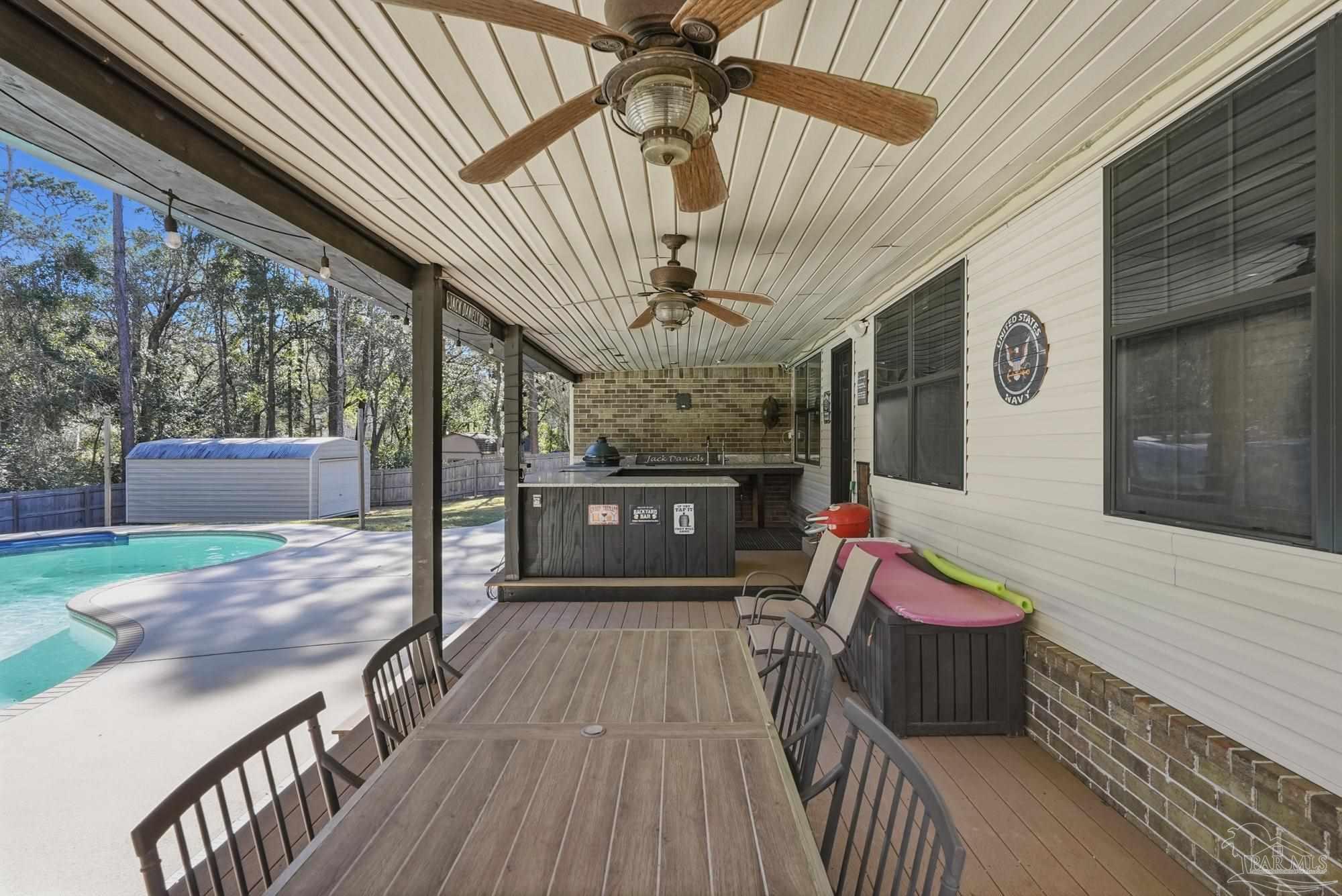 10145 Huntsman Path Pensacola, FL 32514 - Photo 41 of 47 a view of a chairs and table in the balcony