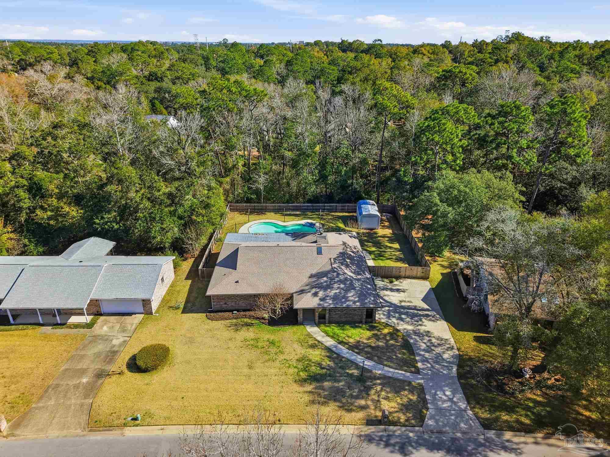 10145 Huntsman Path Pensacola, FL 32514 - Photo 45 of 47 a view of a swimming pool with a yard