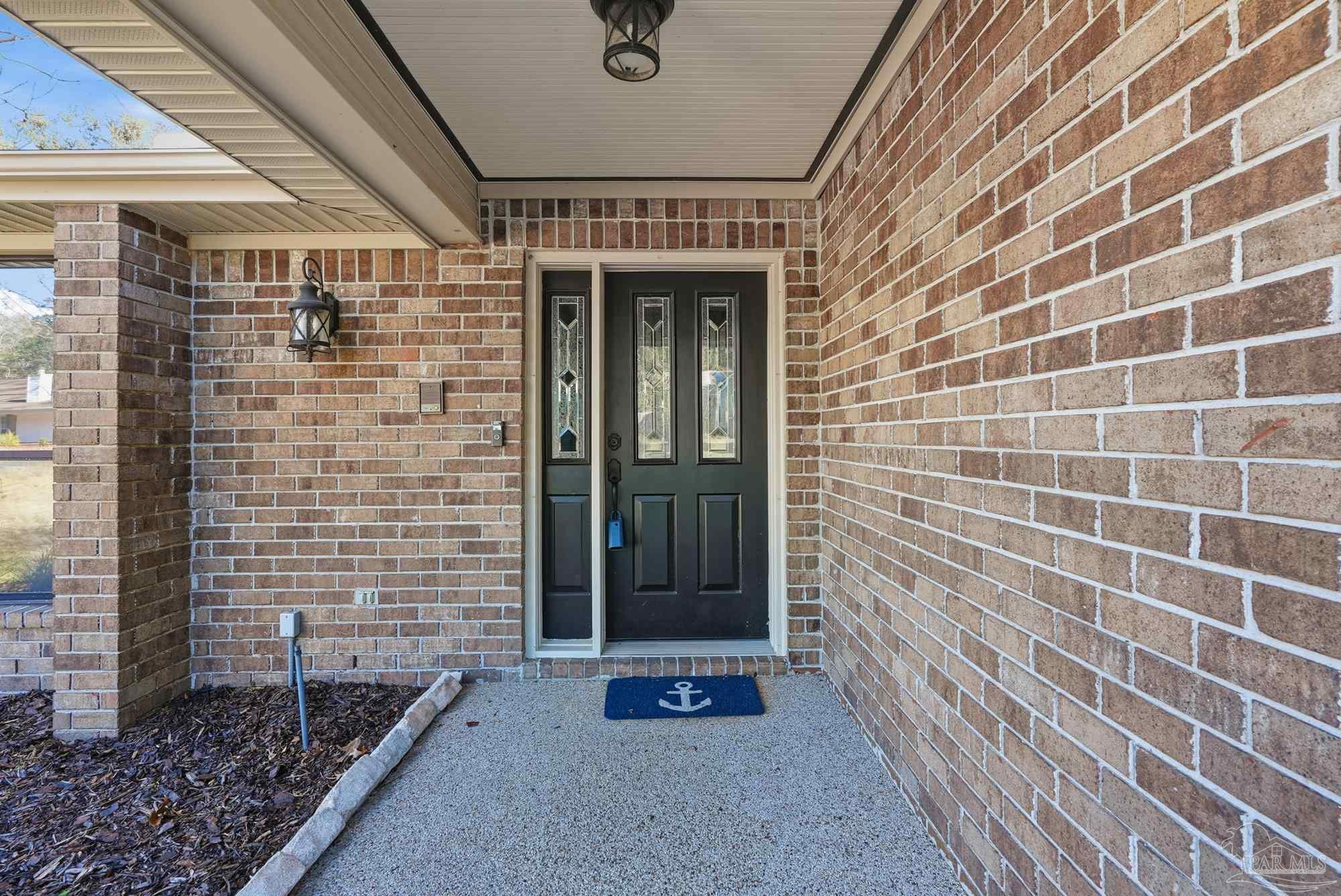 10145 Huntsman Path Pensacola, FL 32514 - Photo 5 of 47 a view of front door of house