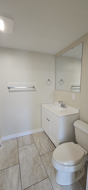 2009 High Street, Unit 2013 Three Rivers, MA 01080 - Photo 8 of 13 a bathroom with a toilet sink and mirror