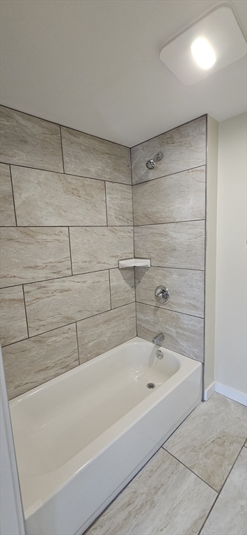 2009 High Street, Unit 2013 Three Rivers, MA 01080 - Photo 9 of 13 a bathroom with a bathtub and shower