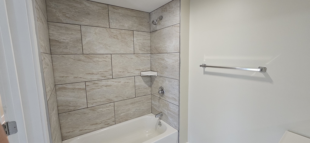 2009 High Street, Unit 2013 Three Rivers, MA 01080 - Photo 10 of 13 a bathroom with a bathtub