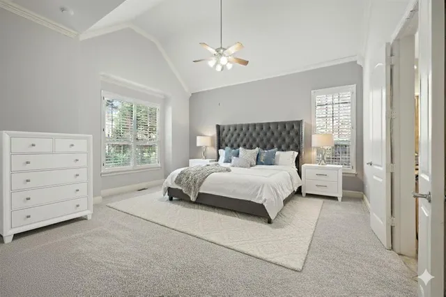 a bed room with a bed and a night stand