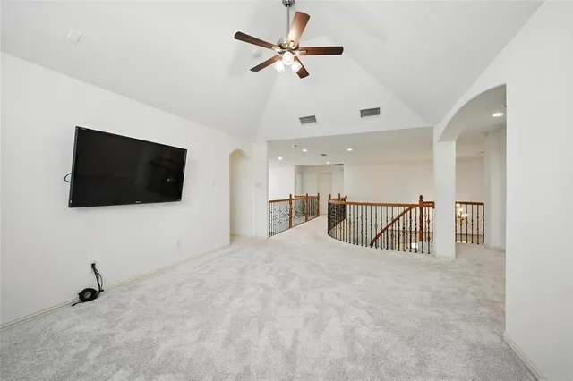 a view of a livingroom with a flat screen tv