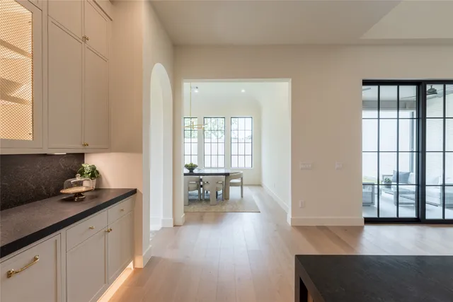 a view of a dining room with furniture and window