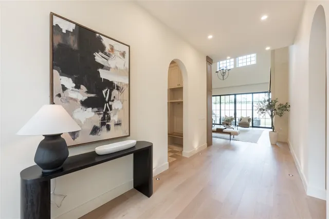 a view of living room with furniture and wooden floor
