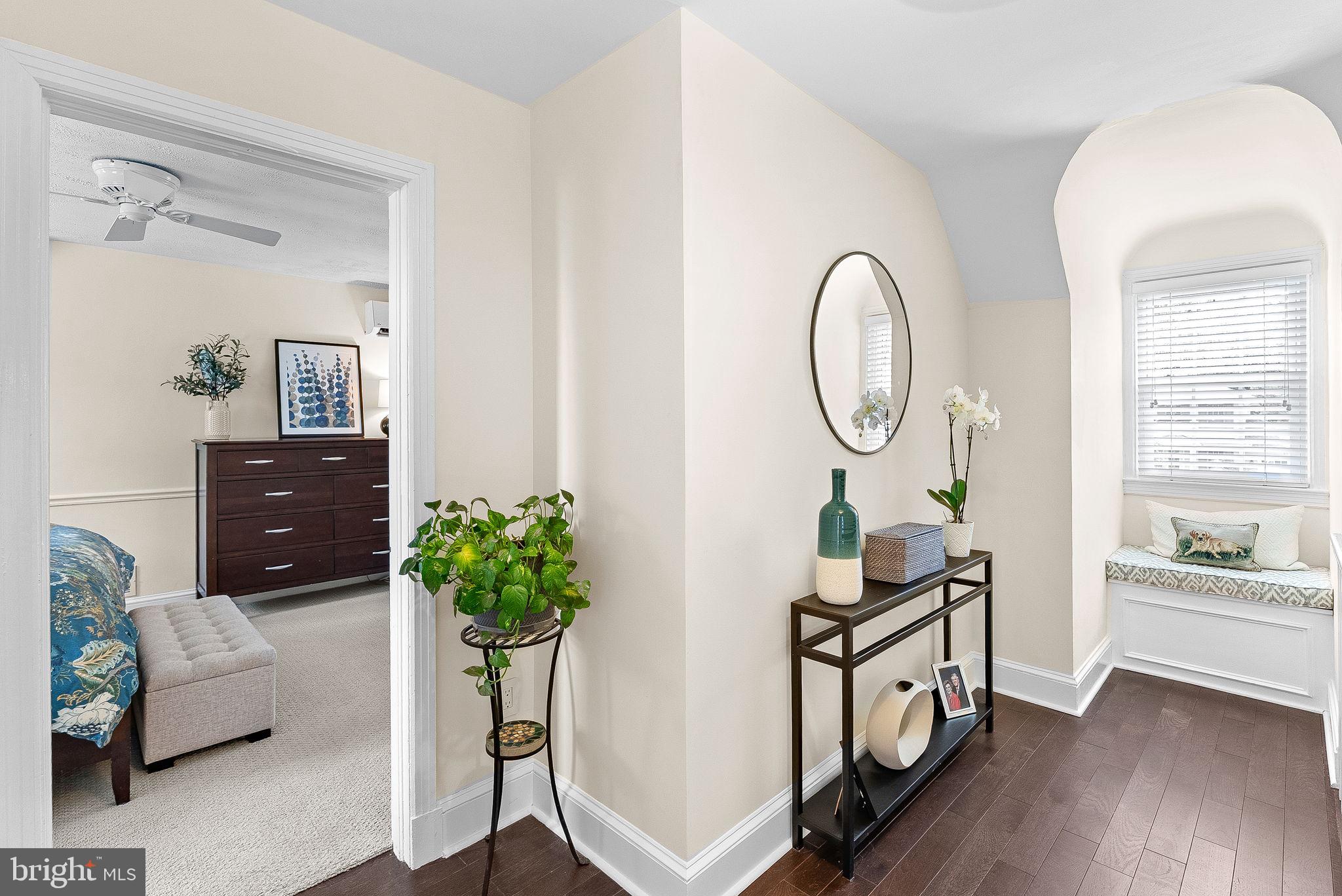 10313 Parkman Road Silver Spring, MD 20903 - Photo 24 of 61 a living room with furniture and a potted plant