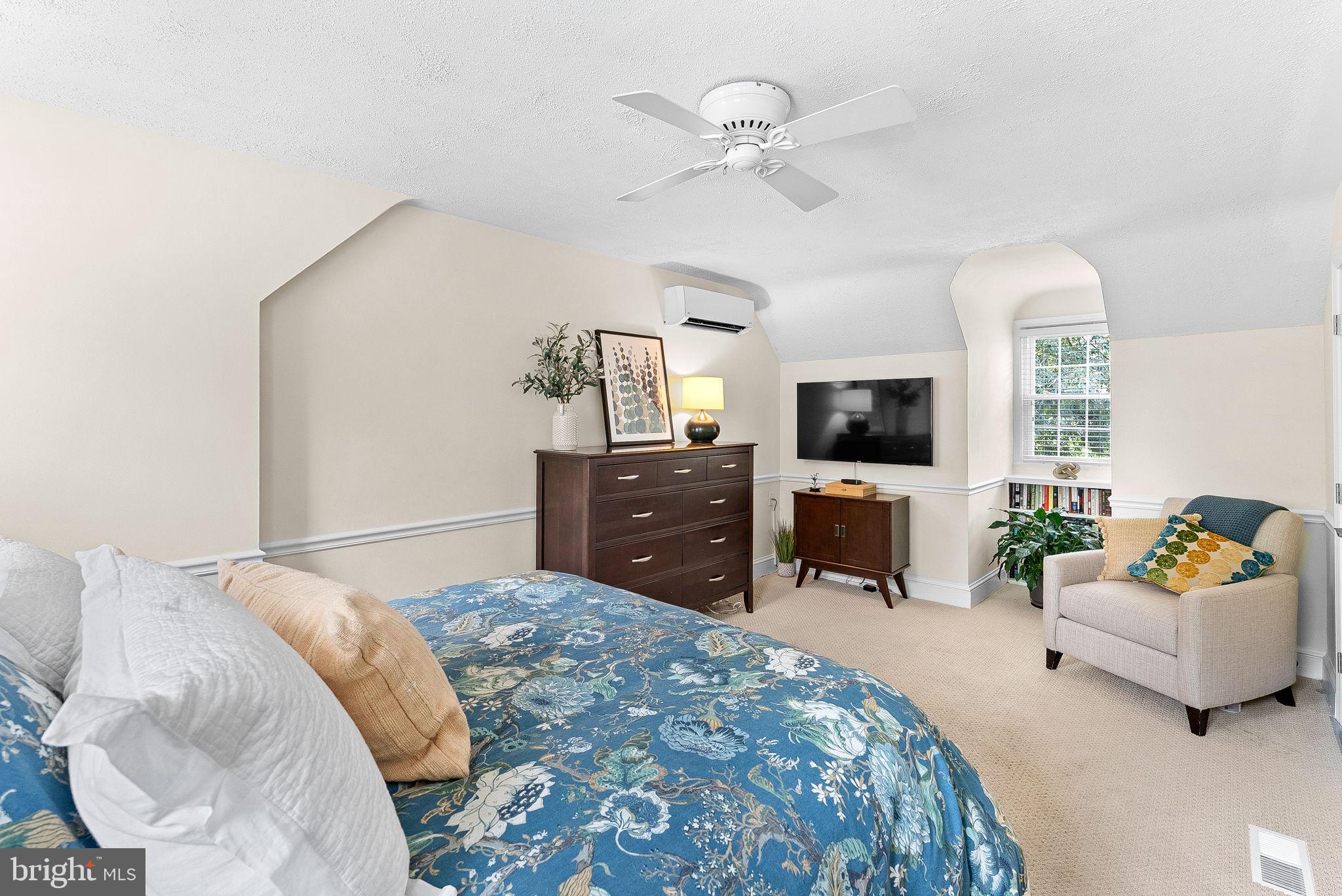 10313 Parkman Road Silver Spring, MD 20903 - Photo 27 of 61 a bedroom with a bed and furniture