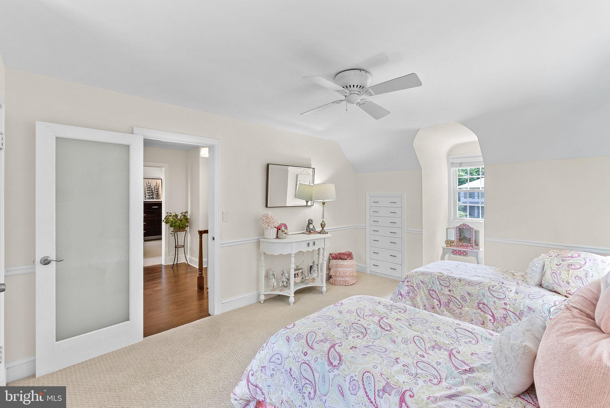 10313 Parkman Road Silver Spring, MD 20903 - Photo 31 of 61 a bedroom with a bed and a view of living room