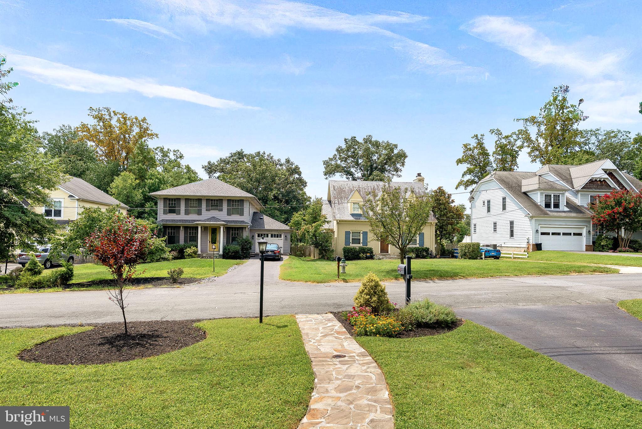 10313 Parkman Road Silver Spring, MD 20903 - Photo 50 of 61 a front view of a house with a yard