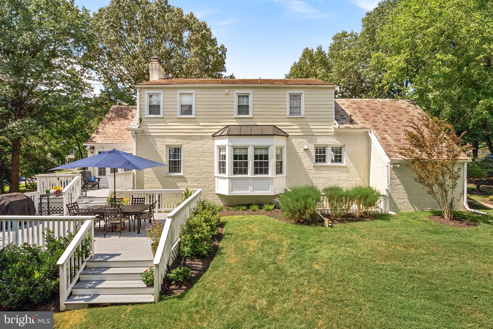 10313 Parkman Road Silver Spring, MD 20903 - Photo 60 of 61 a front view of a house with a yard