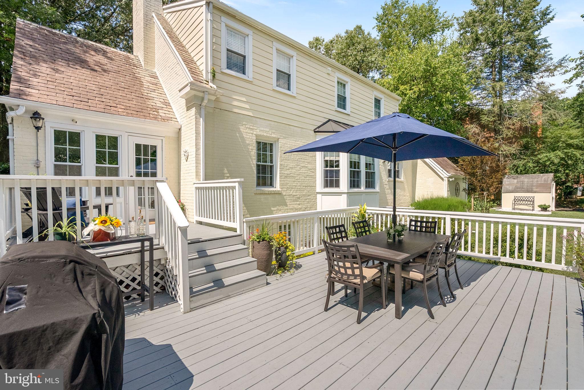 10313 Parkman Road Silver Spring, MD 20903 - Photo 61 of 61 a view of a house with wooden deck and furniture