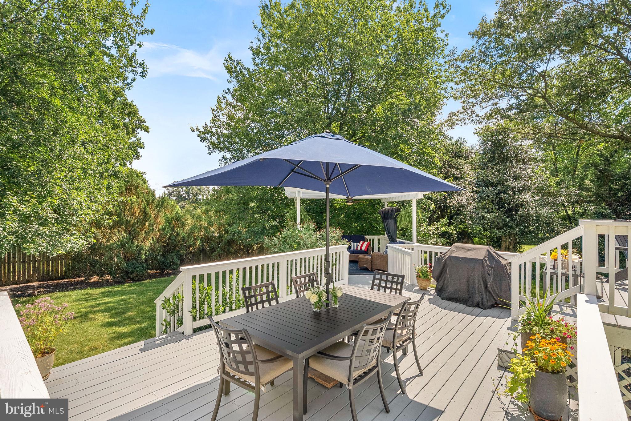 10313 Parkman Road Silver Spring, MD 20903 - Photo 7 of 61 a view of balcony with wooden floor and outdoor seating