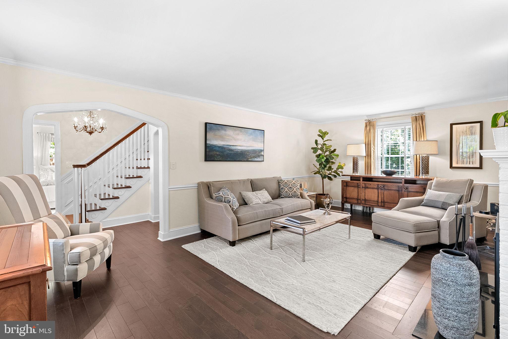 10313 Parkman Road Silver Spring, MD 20903 - Photo 9 of 61 a living room with furniture and a flat screen tv