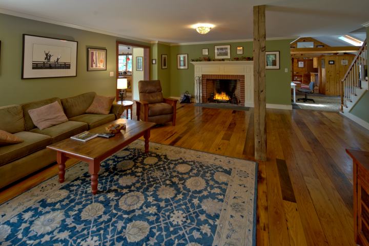 16 Meshacket Road Edgartown, MA 02539 - Photo 12 of 41 a living room with furniture and a fireplace