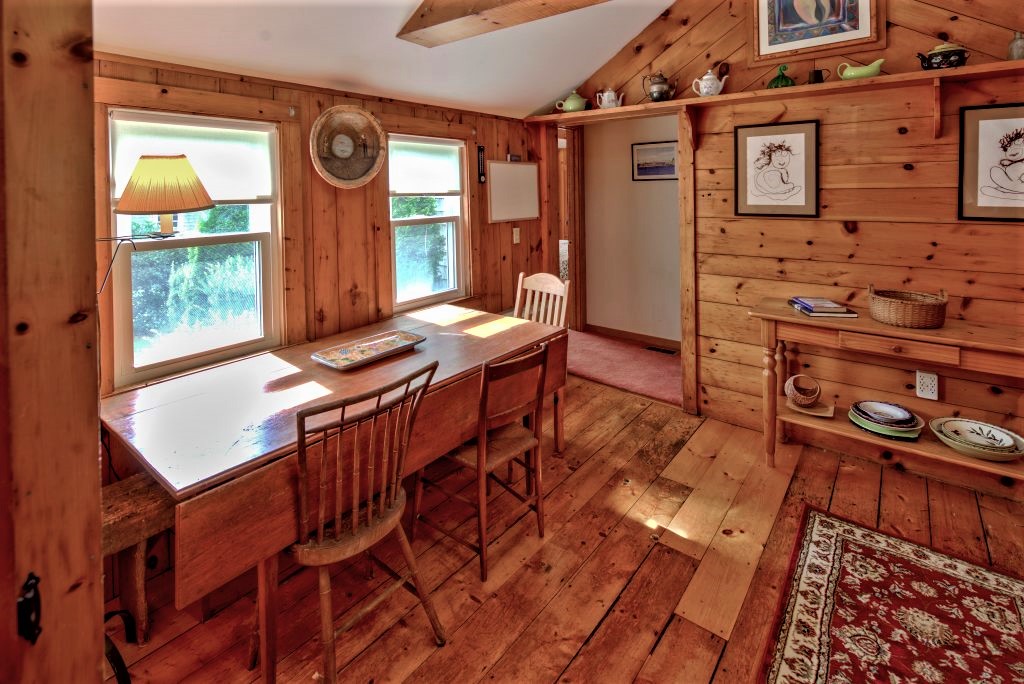 16 Meshacket Road Edgartown, MA 02539 - Photo 18 of 41 a view of a dining room with furniture window and outside view