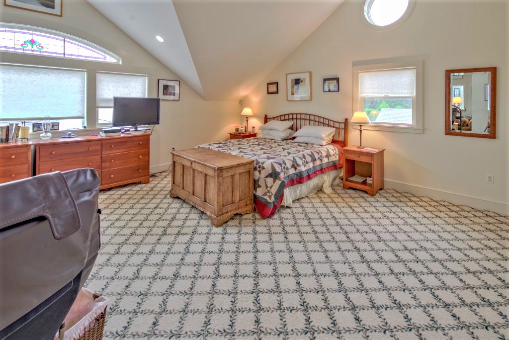 16 Meshacket Road Edgartown, MA 02539 - Photo 24 of 41 a bedroom with a bed and window