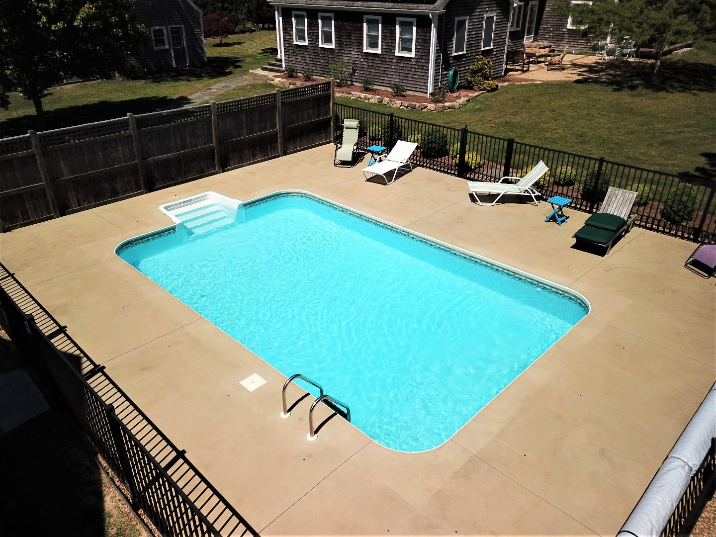16 Meshacket Road Edgartown, MA 02539 - Photo 40 of 41 a view of a swimming pool with lounge chair