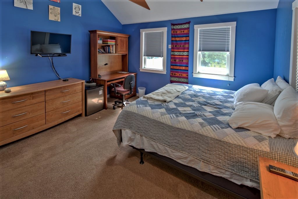 16 Meshacket Road Edgartown, MA 02539 - Photo 10 of 41 a bed room with a bed and a window