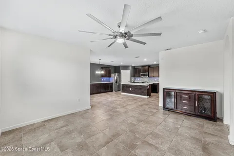 a view of a kitchen counter top space cabinets and stainless steel appliances