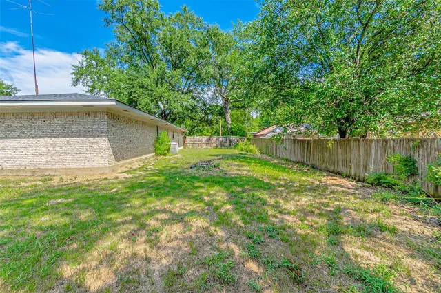 a view of outdoor space and yard