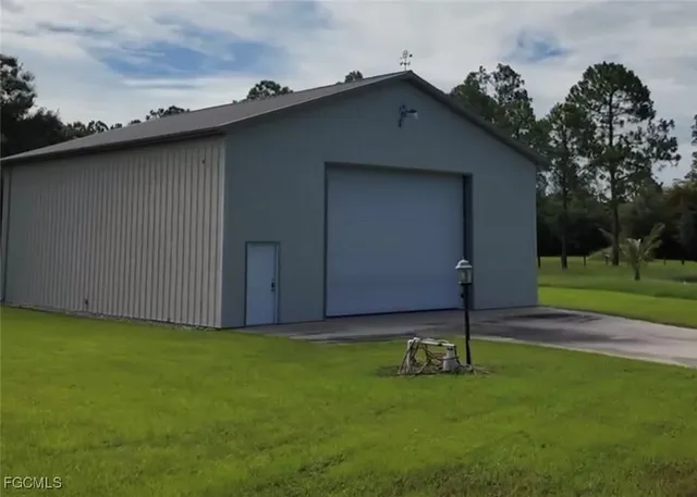 a fire hydrant in the middle of a field