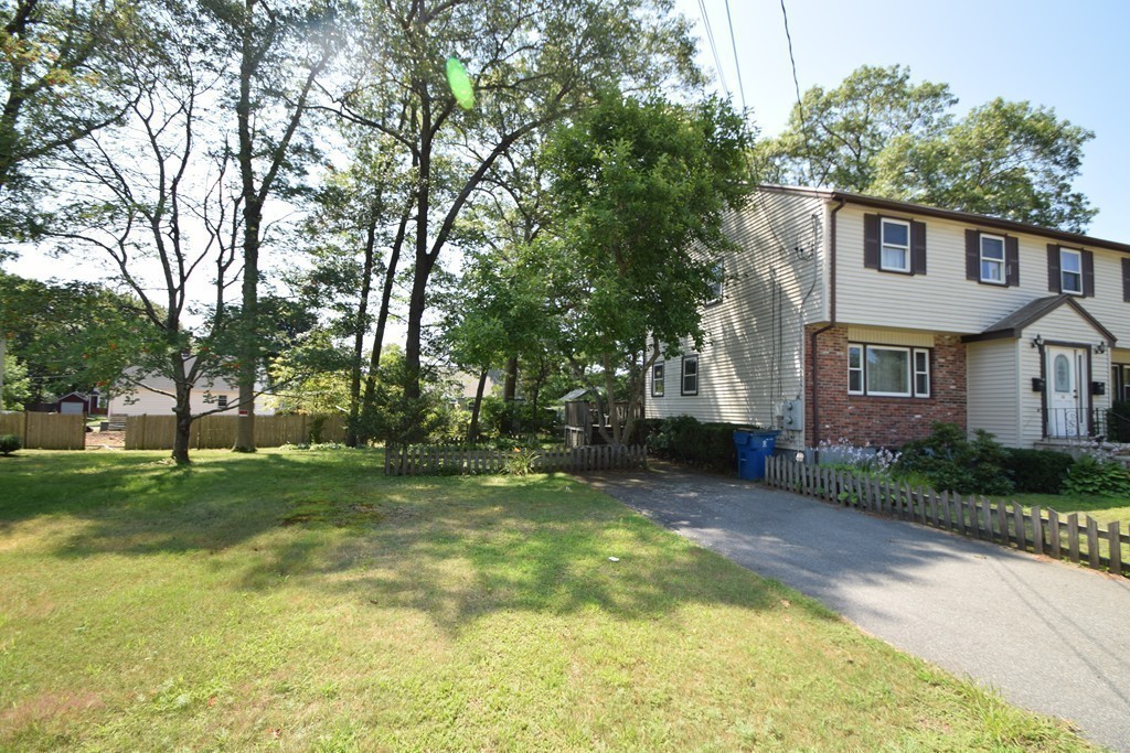 33 Clark Street, Unit A Randolph, MA 02368 - Photo 15 of 15 a view of a house with a backyard