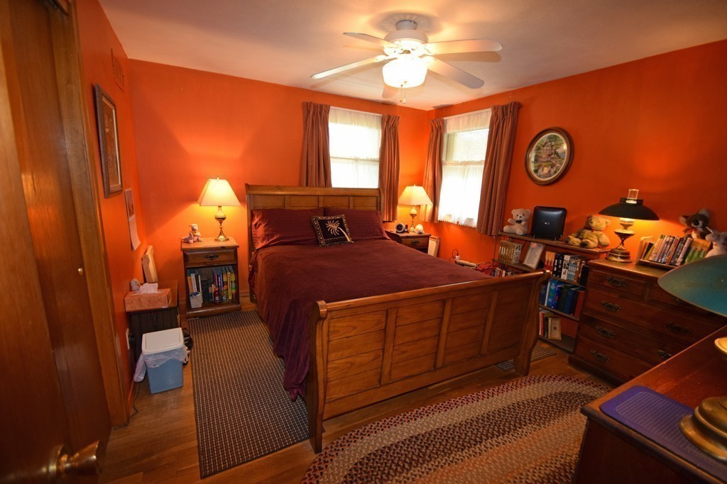 33 Clark Street, Unit A Randolph, MA 02368 - Photo 9 of 15 a bedroom with furniture and a window