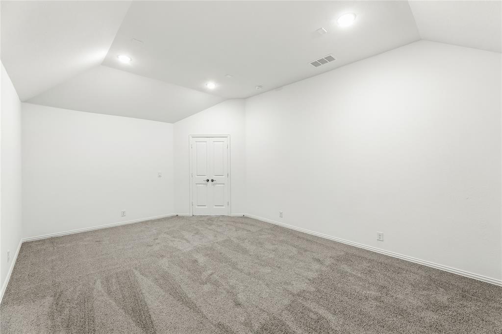 1145 Hitching Post Way Oak Point, TX 75068 - Photo 33 of 39 an empty room with an entryway