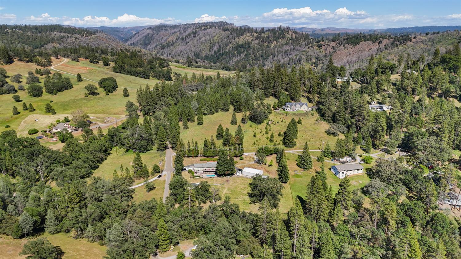 0 Hoot Owl Ravine Road Placerville, CA 95667 - Photo 14 of 20 an aerial view of residential house with parking space and mountain view in back