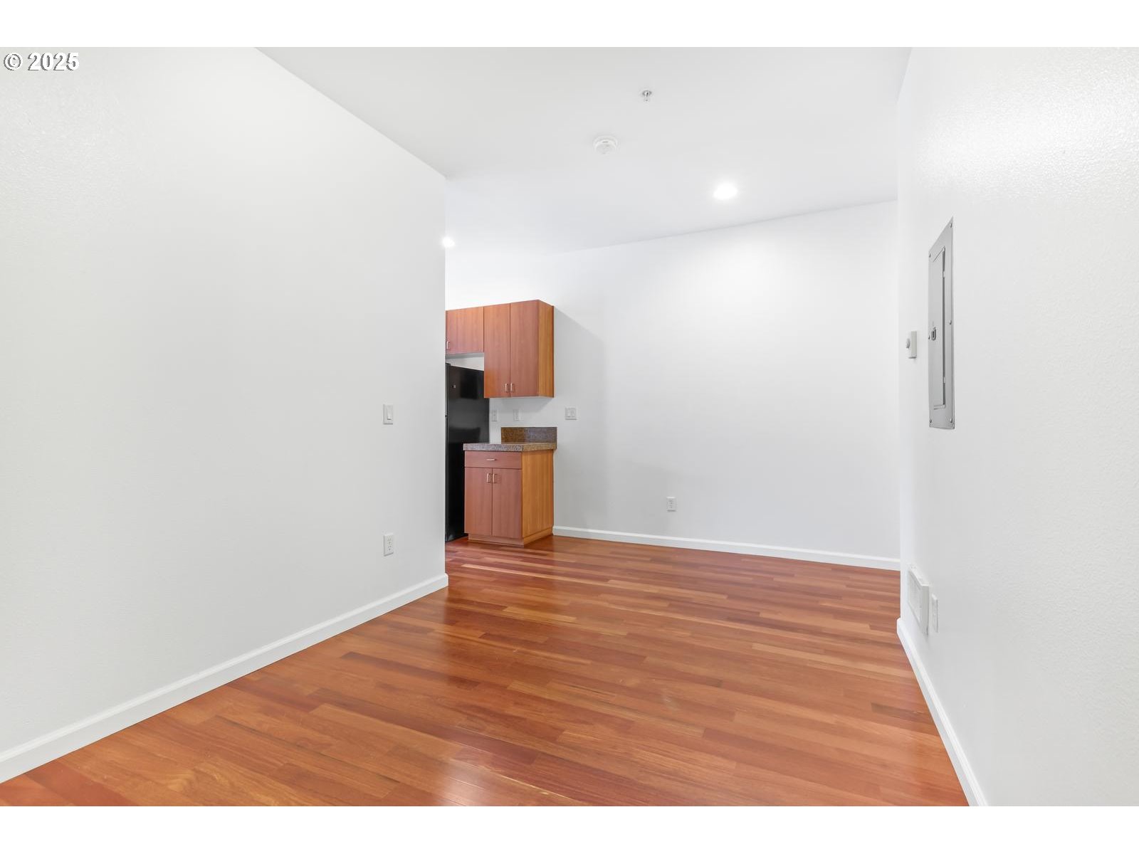8712 North Decatur Street, Unit 105 Portland, OR 97203 - Photo 23 of 38 a view of empty room with wooden floor