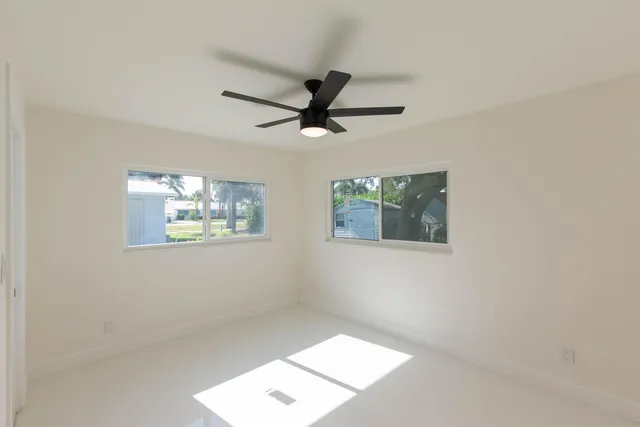 a view of a hallway with a window