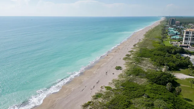 a view of a lake with a yard