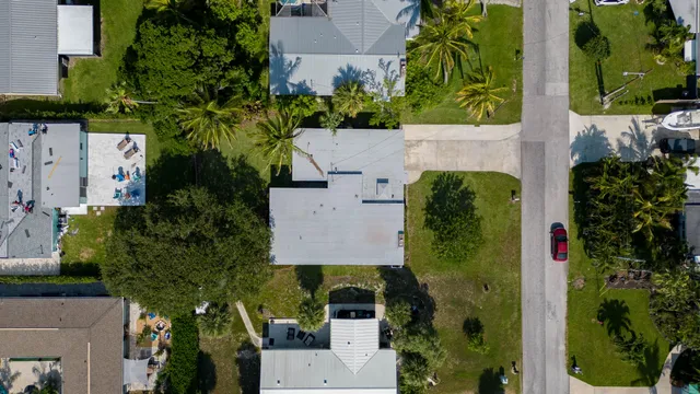 an aerial view of a house with a garden