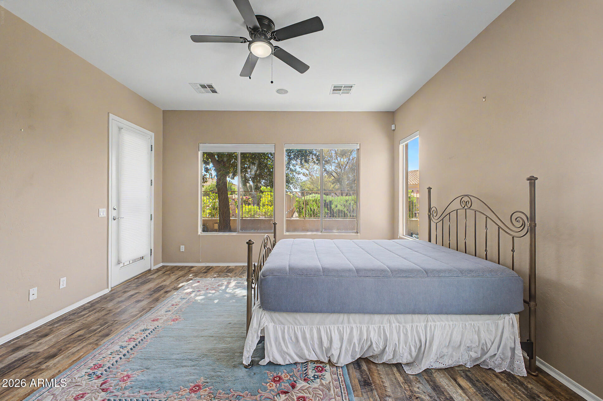 5090 South Ranger Trail Gilbert, AZ 85298 - Photo 15 of 50 a bedroom with a large bed and a window