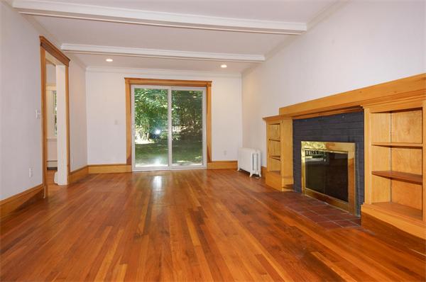 7 Burr Road Newton, MA 02459 - Photo 3 of 13 a view of an empty room with wooden floor and a window