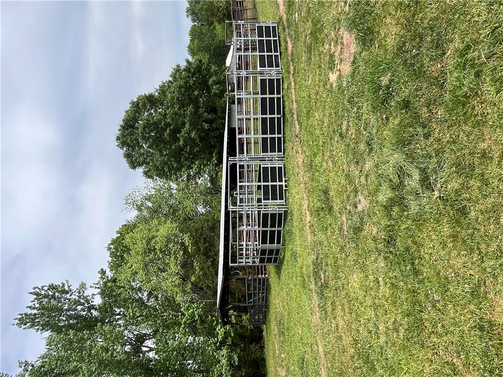 107 Humphrey Wright Road Honea Path, SC 29654 - Photo 13 of 23 This expansive yard features ample space and robust fencing, ideal for various outdoor activities.