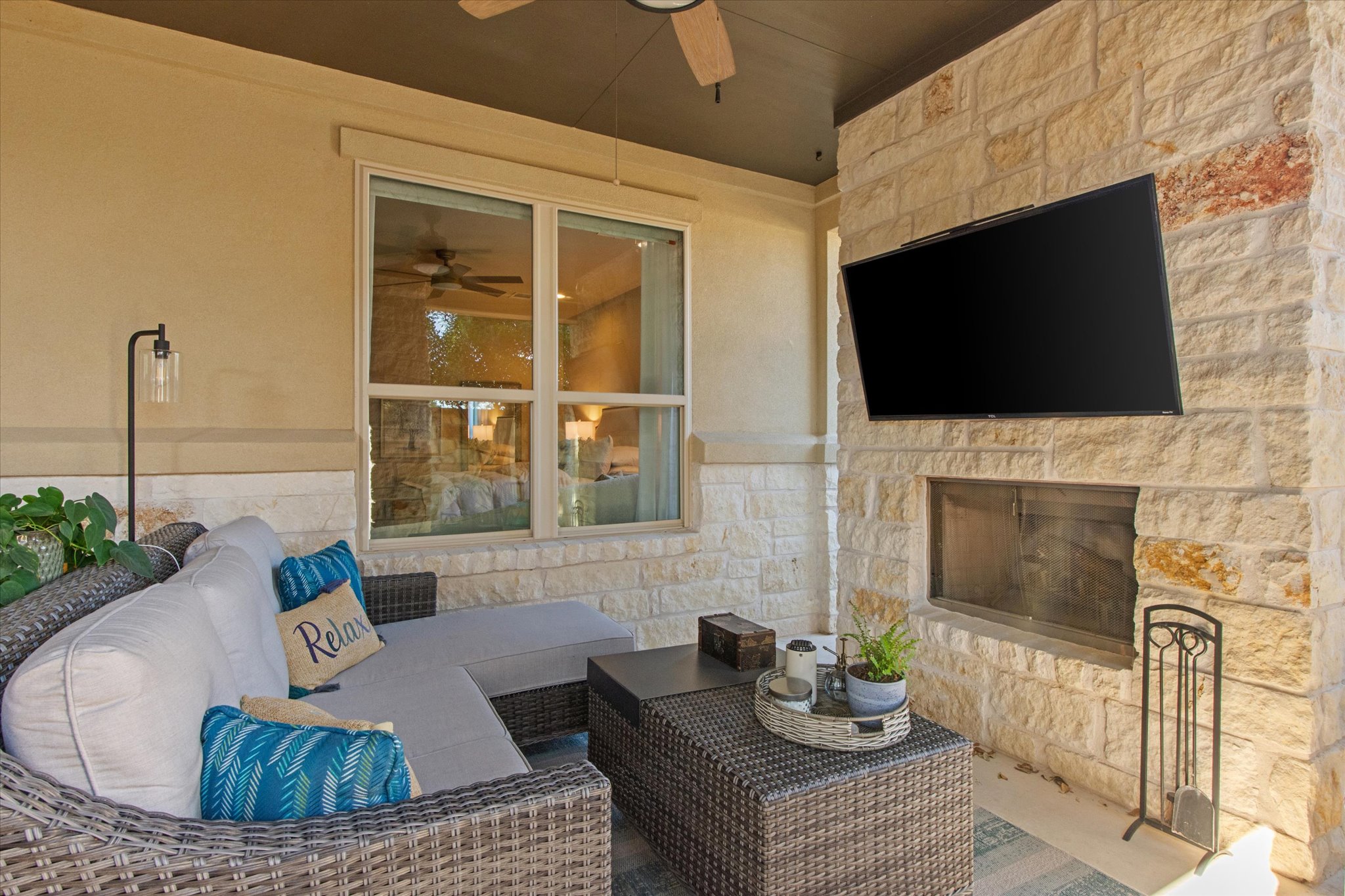 549 Clubhouse Drive, Unit G Georgetown, TX 78628 - Photo 23 of 35 a living room with furniture a fireplace and a flat screen tv
