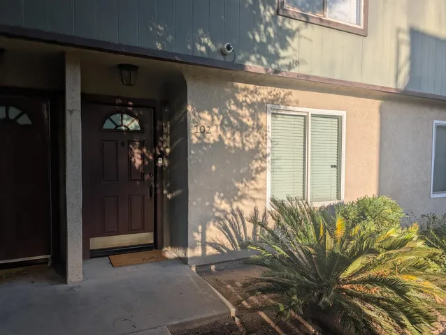 a view of a entryway with a hallway