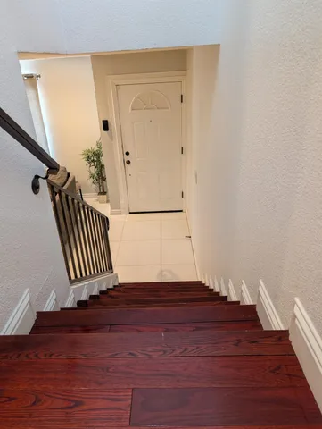 a view of wooden floor and staircase