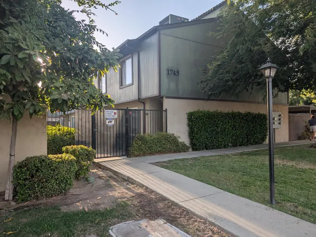 a view of a back yard of the house