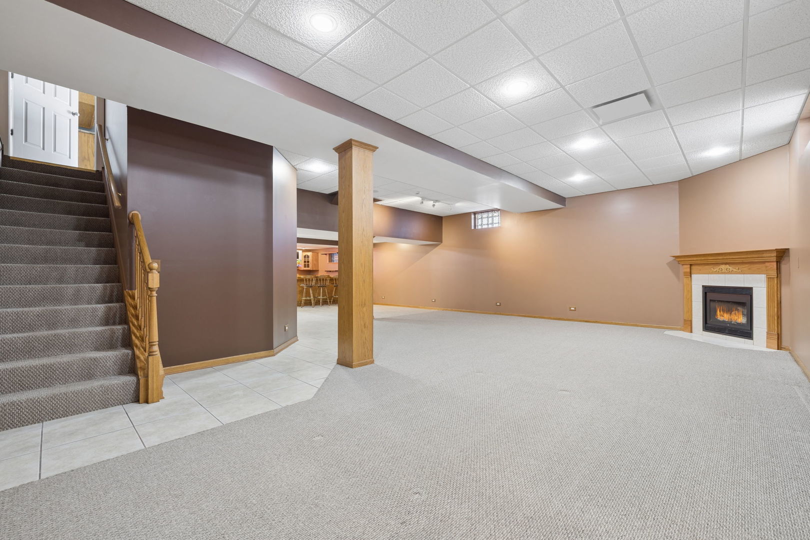 1336 Tralee Lane Lockport, IL 60441 - Photo 20 of 35 a view of an empty room with a fireplace