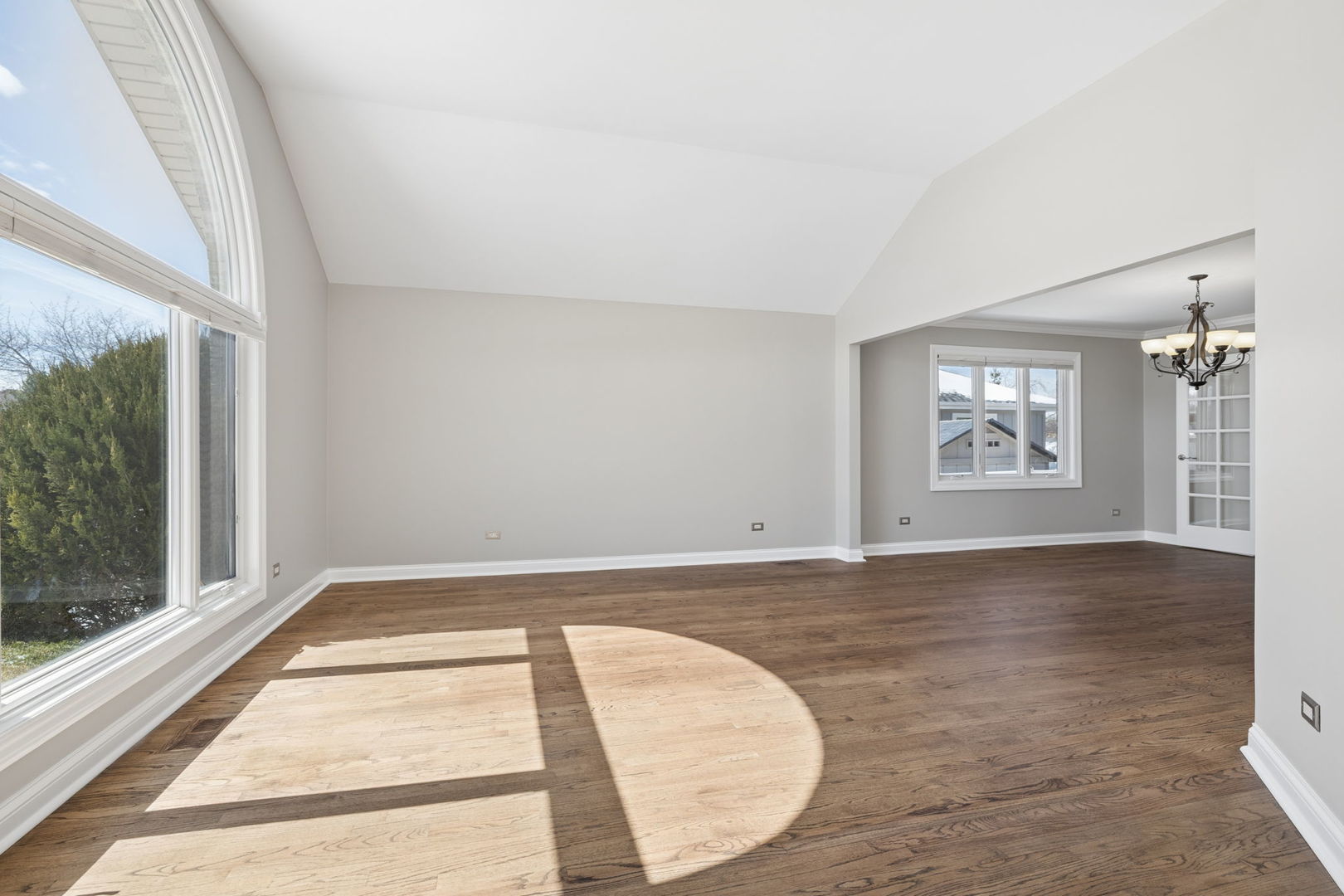 1336 Tralee Lane Lockport, IL 60441 - Photo 2 of 35 an empty room with wooden floor and windows
