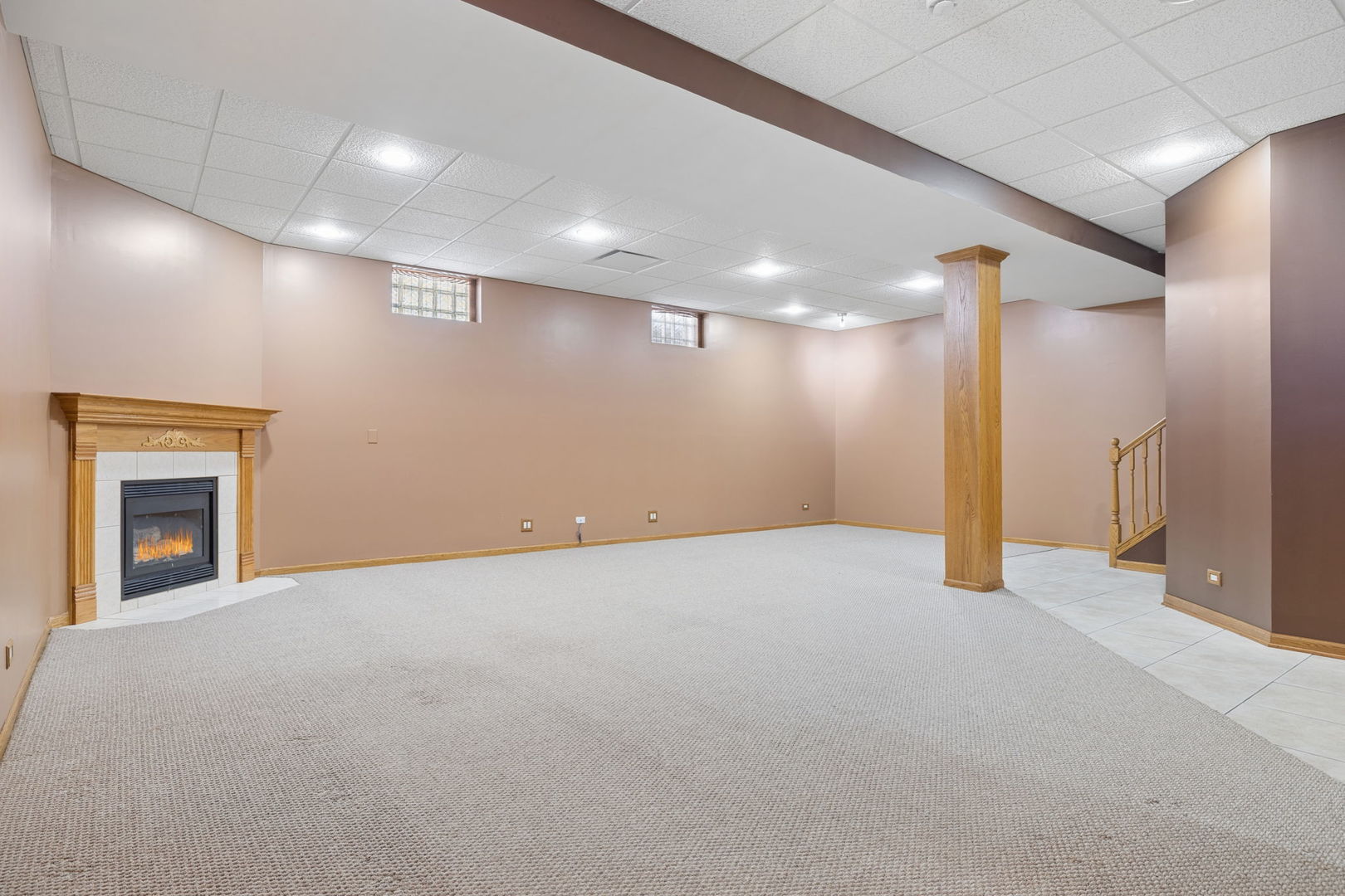 1336 Tralee Lane Lockport, IL 60441 - Photo 21 of 35 a view of an empty room with a fireplace