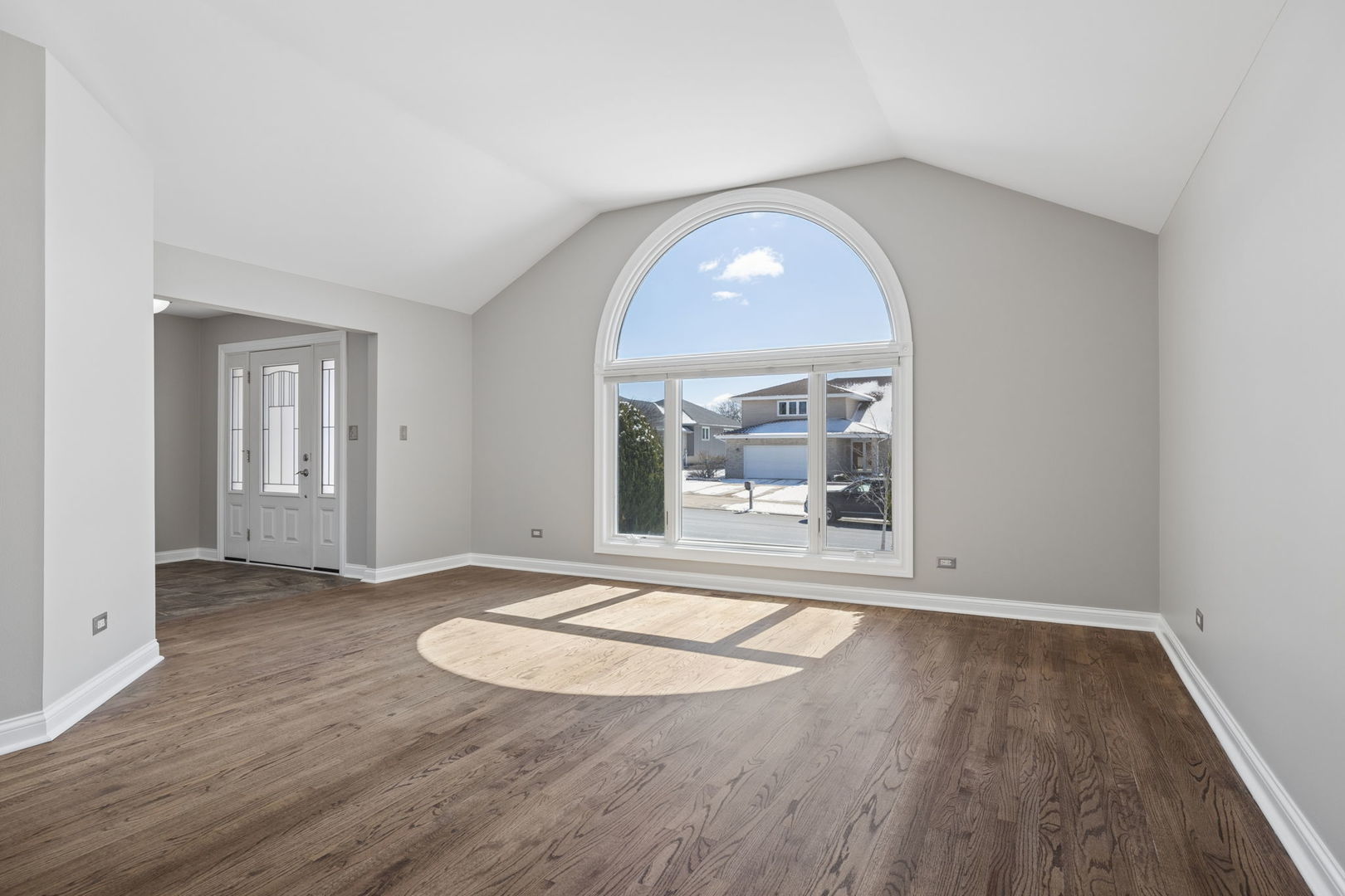 1336 Tralee Lane Lockport, IL 60441 - Photo 4 of 35 an empty room with wooden floor and windows
