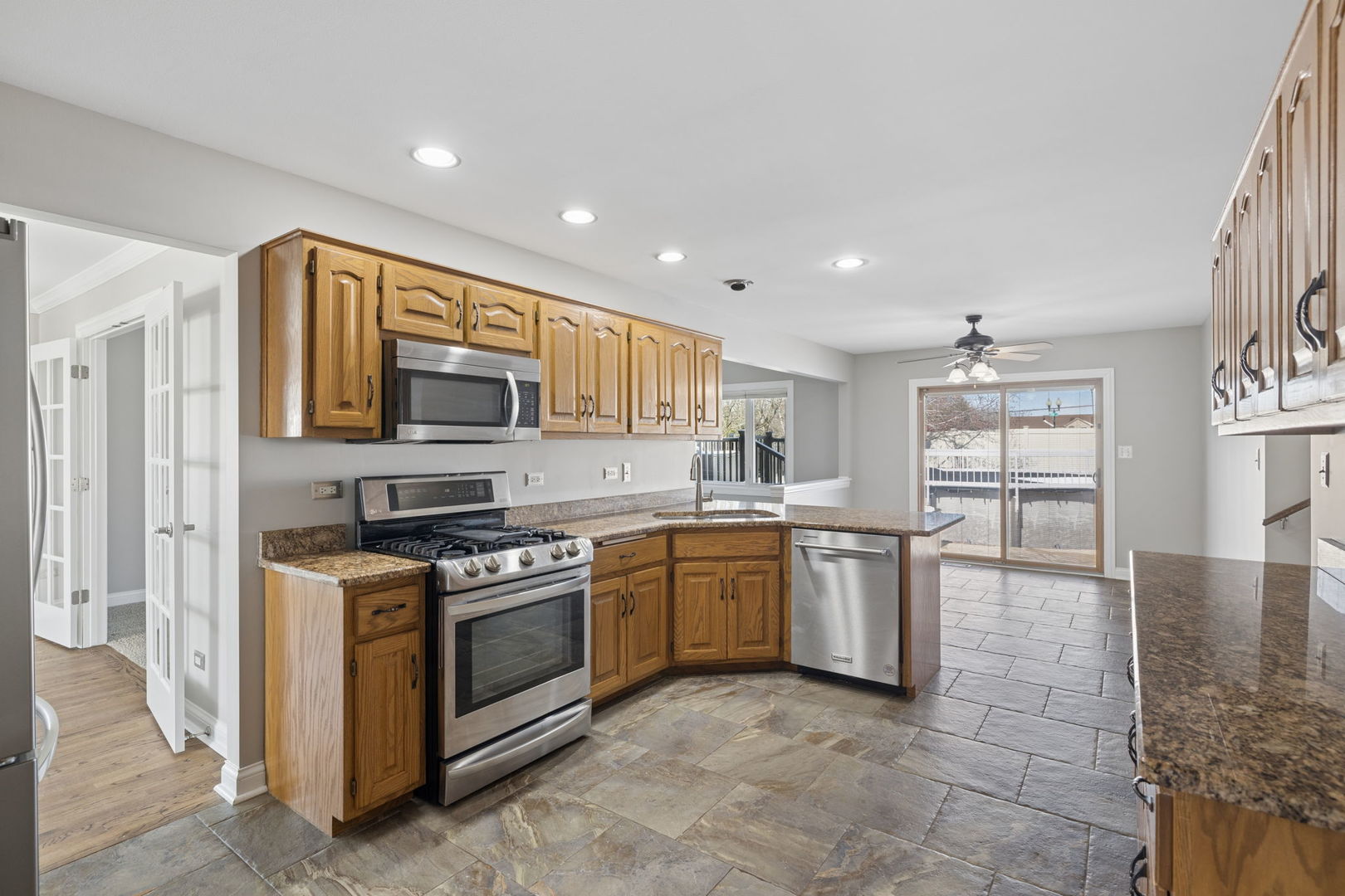 1336 Tralee Lane Lockport, IL 60441 - Photo 6 of 35 a kitchen with stove top oven and cabinets
