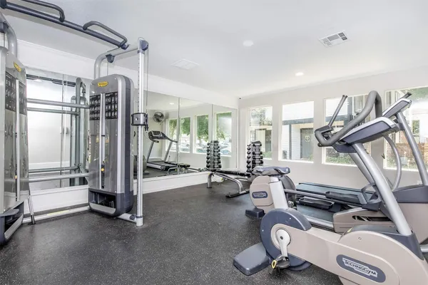 a view of a room with gym equipment