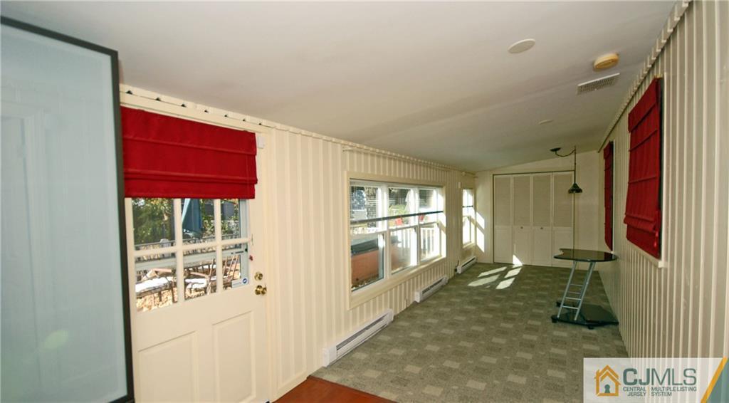 19 Ramsey Road Middlesex, NJ 08846 - Photo 8 of 17 a view of a hallway with windows