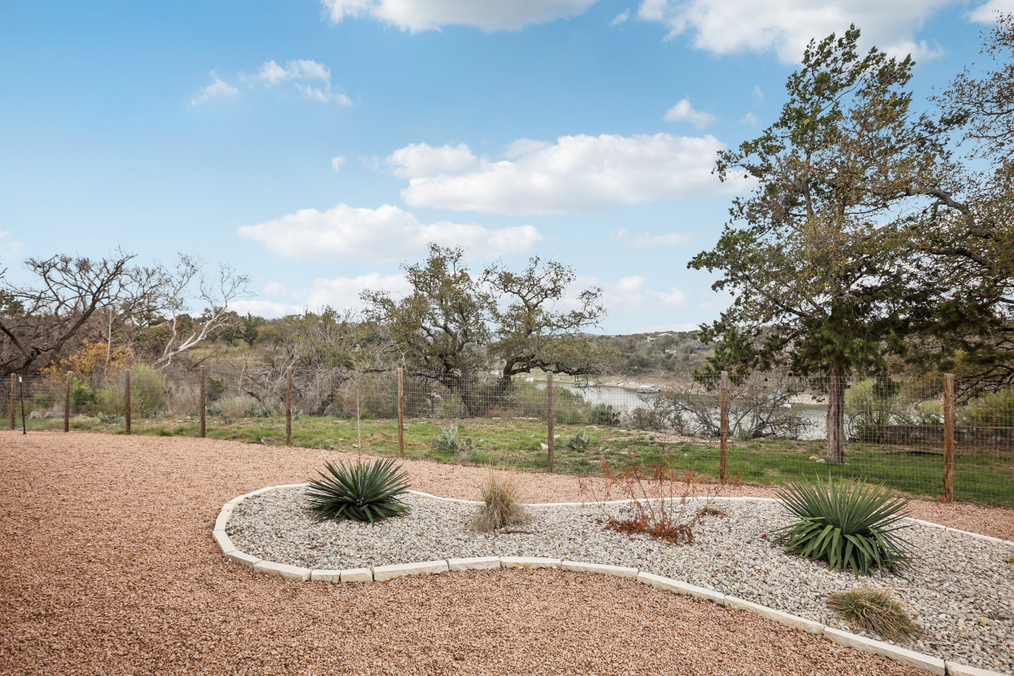 23601 Old Ferry Road, Unit 22 Spicewood, TX 78669 - Photo 28 of 38 Backyard