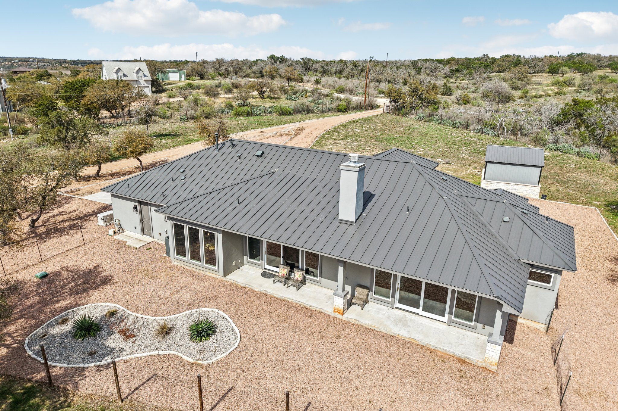 23601 Old Ferry Road, Unit 22 Spicewood, TX 78669 - Photo 38 of 38 Metal roof ensures longevity
